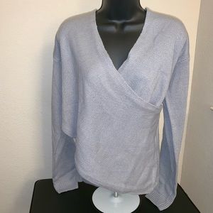 New without tags. Gray low cut sweater